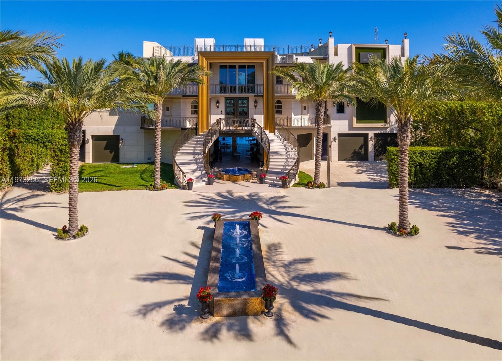 Royal Palm Courtyard with mosaic fountains and sculptured foliage