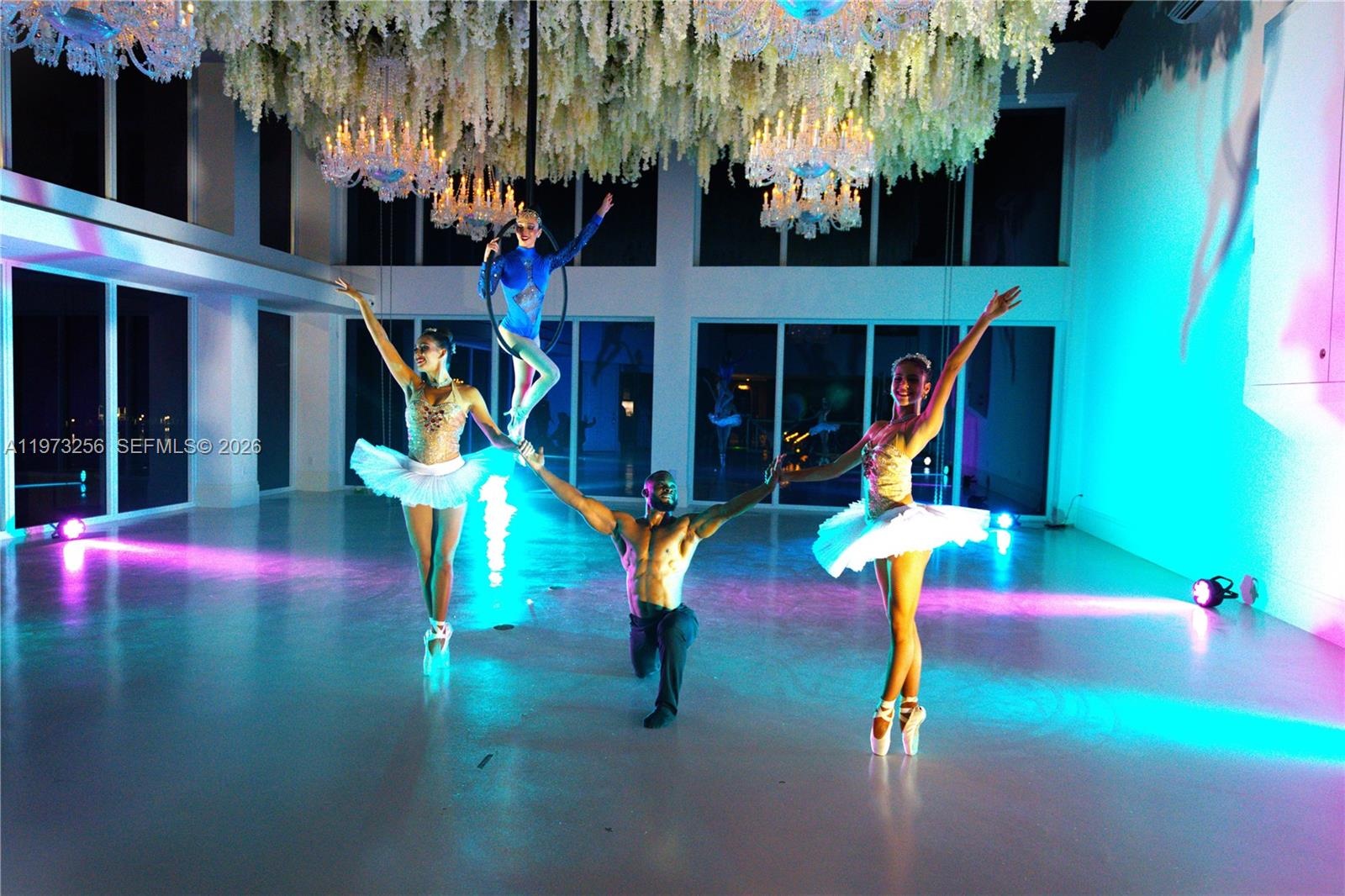 Ballroom event space with colorful lighting